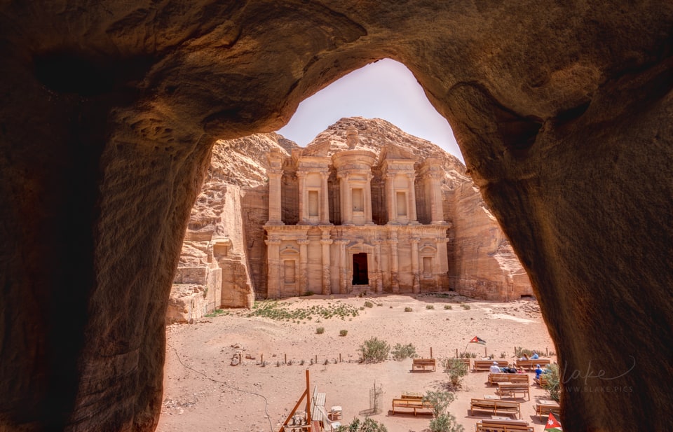 The Monastery (Ad Deir) framed by the mouth of a rock-cut cave, Petra, Jordan
