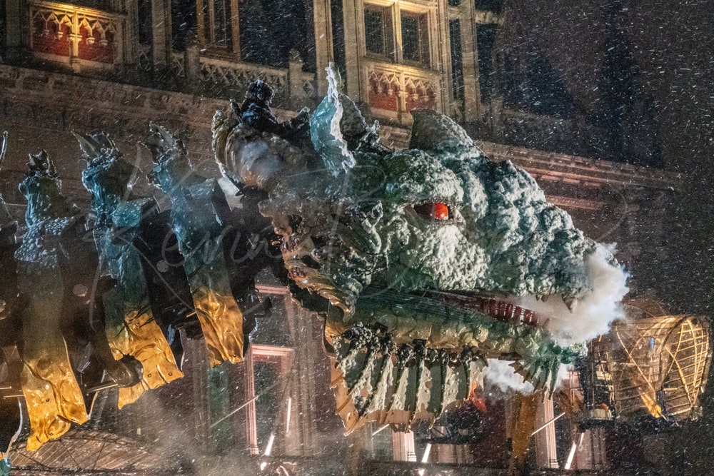 Le Dragon de Calais at night in the rain, steam rising from its mouth, Calais, France